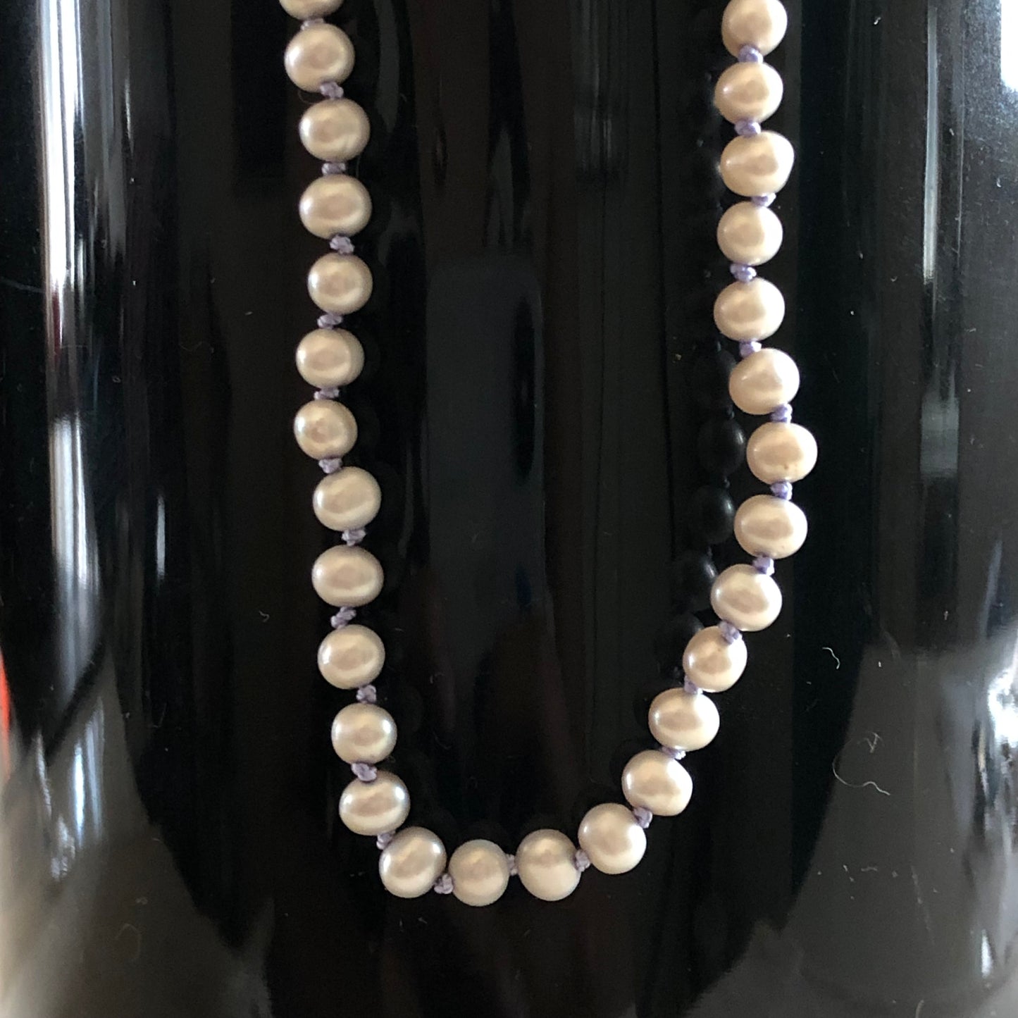 Collar perla gris