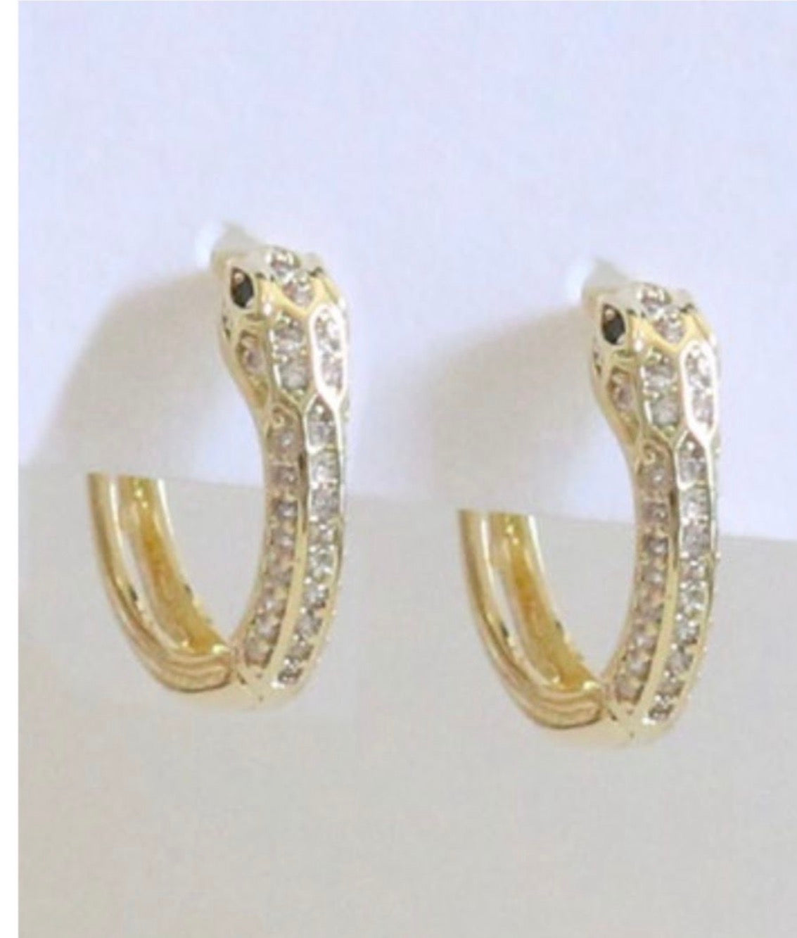 Arete serpiente circonia ojo verde