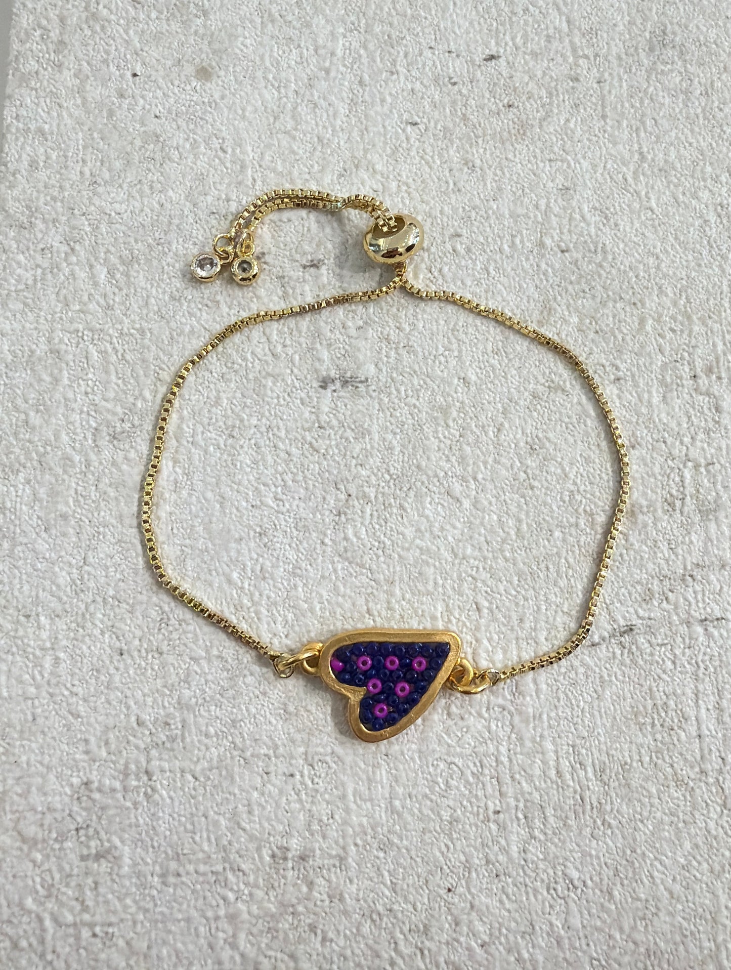 Pulsera cadena corazón morado c/rosa