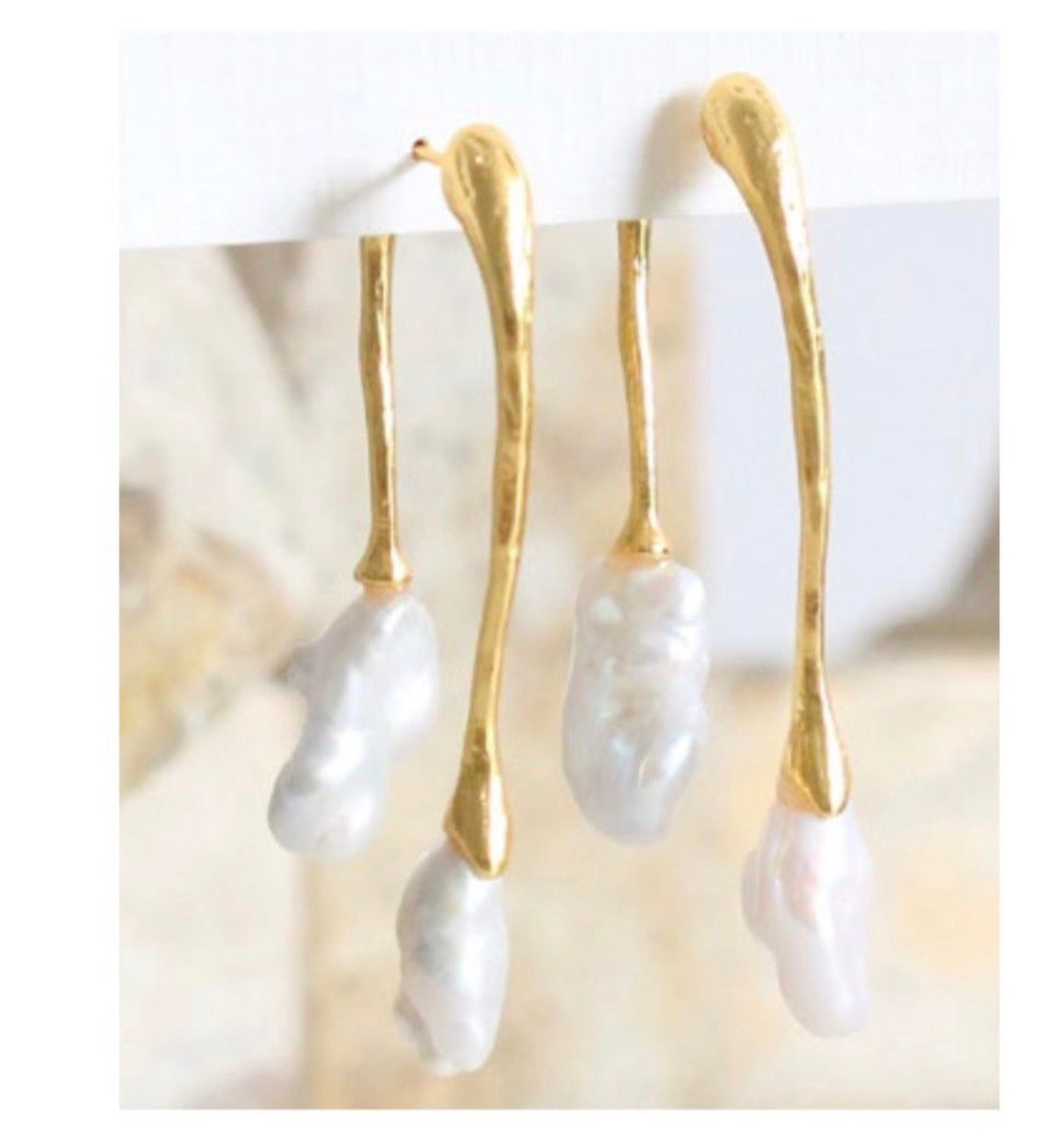 Arete doble perla conector