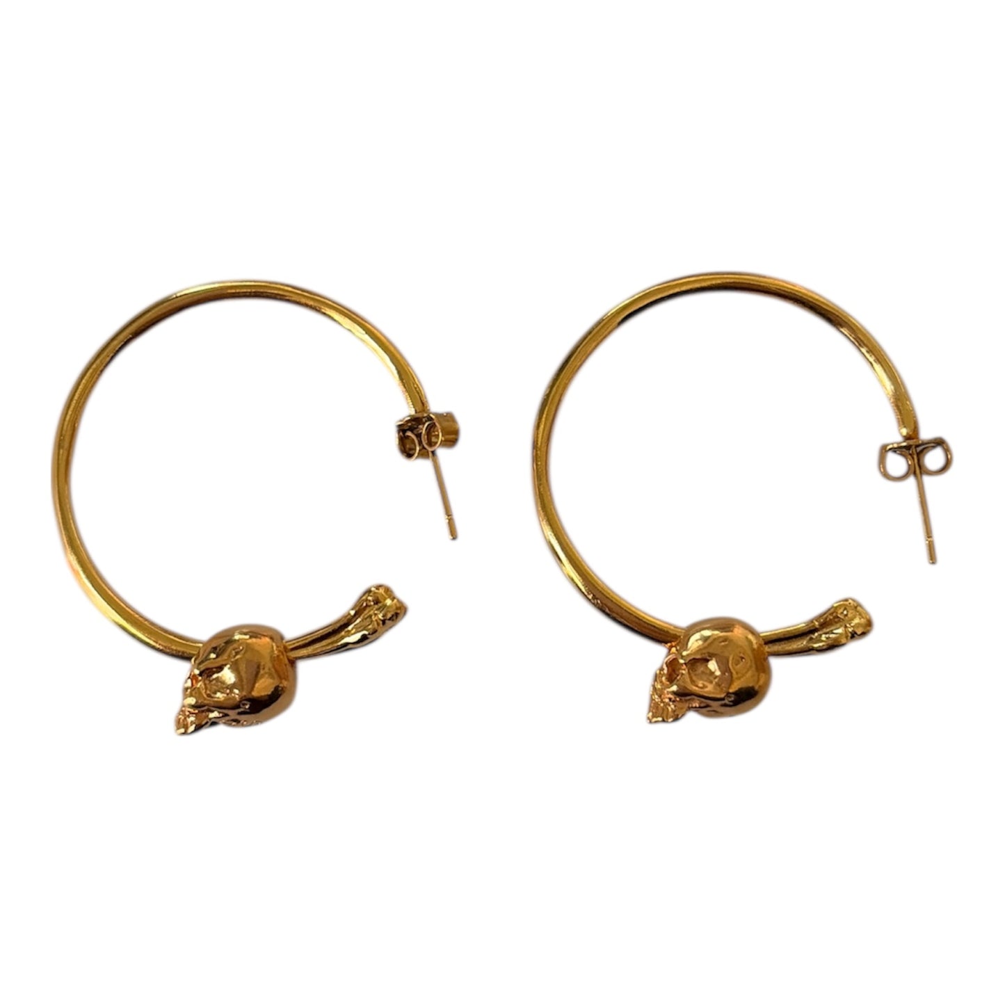 Arracada femur con calavera dorado